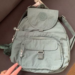 Kipling queenie backpack. color is light aloe